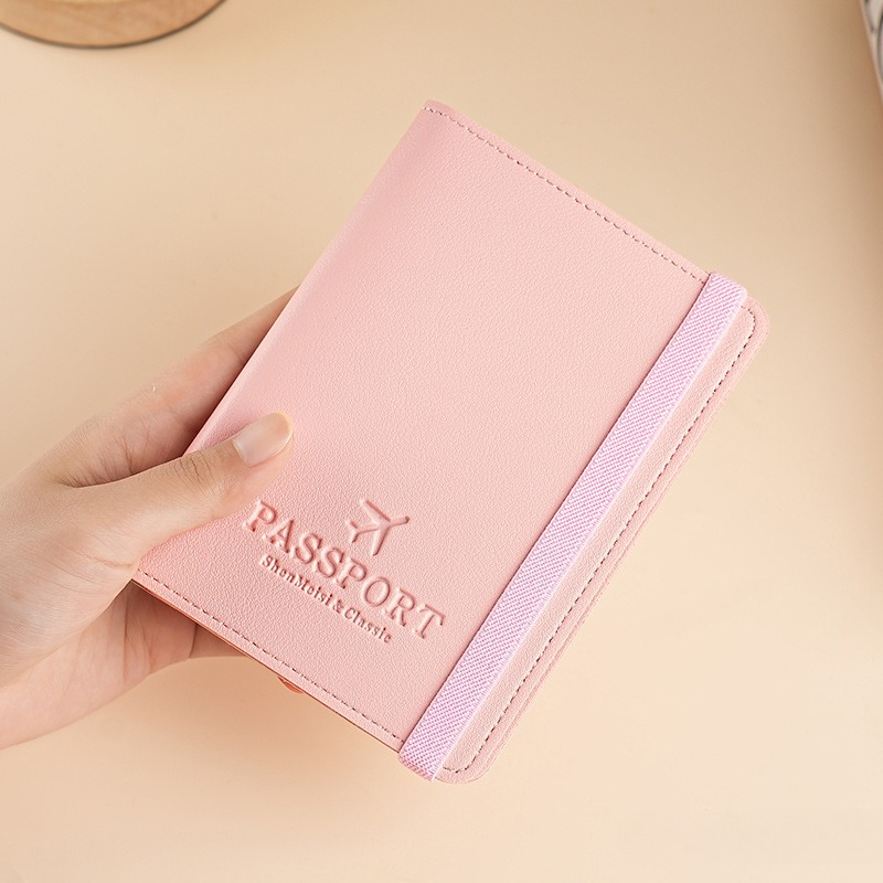 غطاء جواز سفر من الجلد الصناعي - مراجعة Card Top Loader وسعره